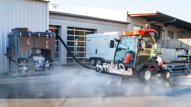 Cleaning of large outdoor areas, parking lots, production and machine halls with driver-controlled systems